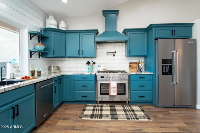 a view of a livingroom with furniture and window