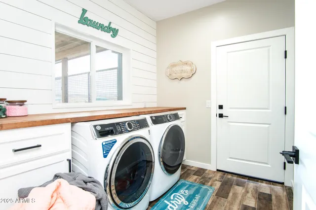 a bathroom with a toilet a sink and a mirror