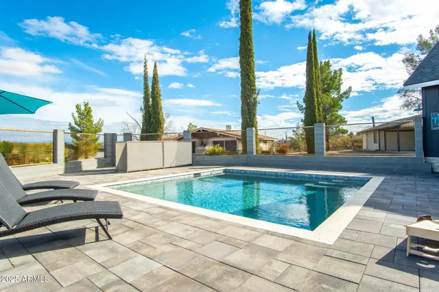 a front view of a house with a outdoor space