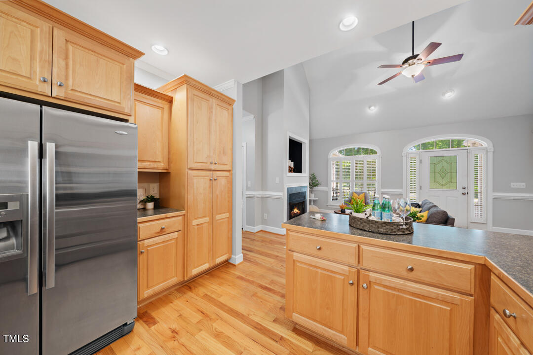 745 Oaks Lane Road Timberlake, NC 27583 - Photo 25 of 38 a kitchen with stainless steel appliances a refrigerator sink and stove