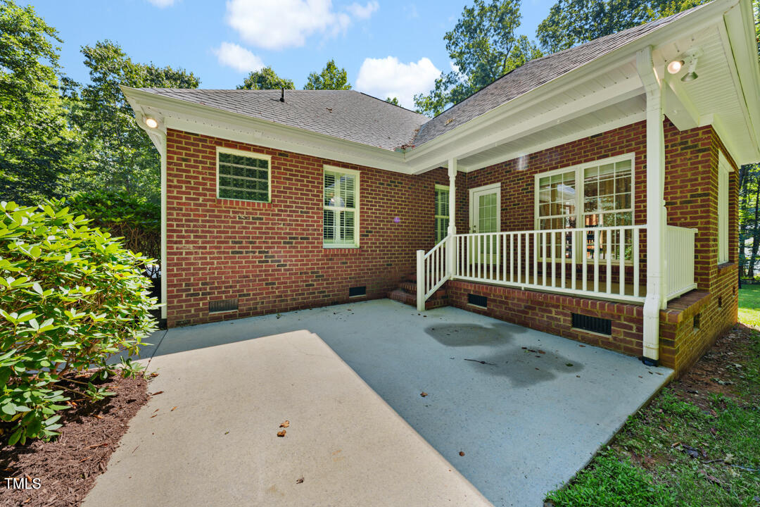 745 Oaks Lane Road Timberlake, NC 27583 - Photo 8 of 38 a view of a house with a yard