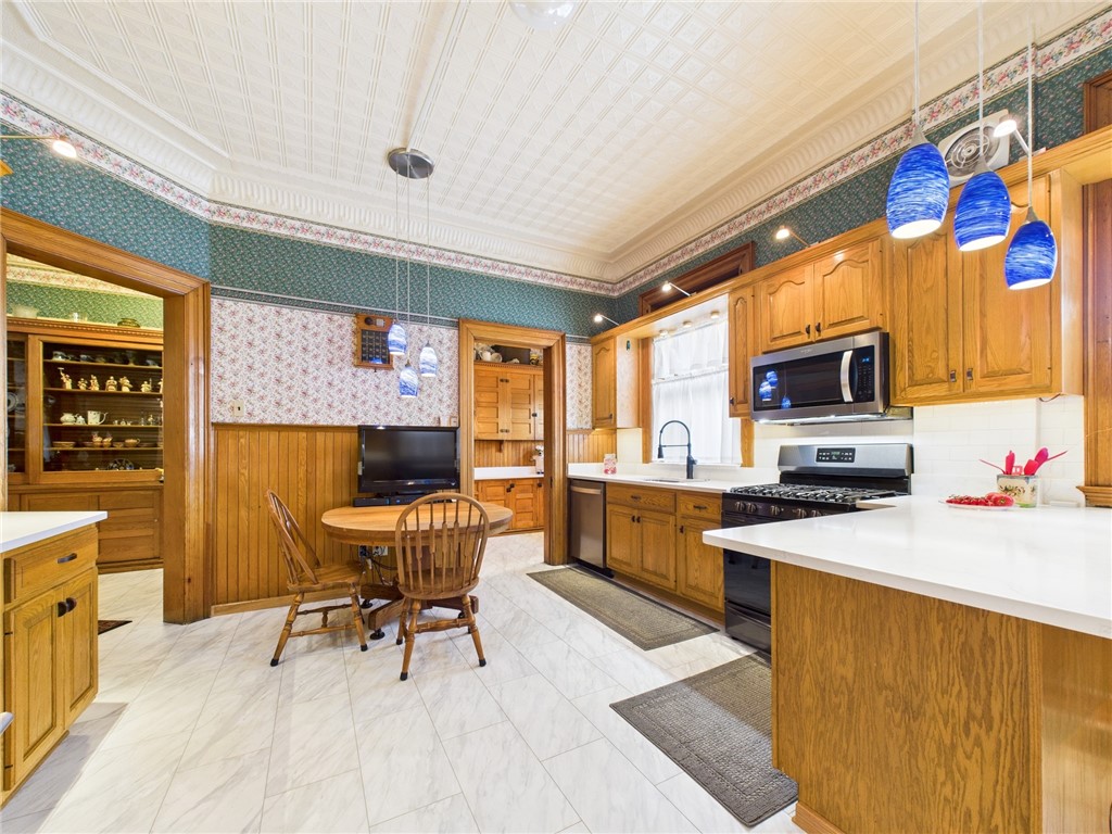 911 West Main Street Smethport, PA 16749 - Photo 23 of 50 Kitchen with Corian countertops and multiple cabin