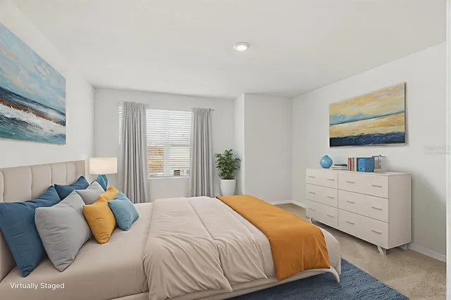 a bathroom with a double vanity sink toilet and a mirror