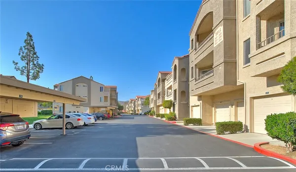 a view of a street with cars