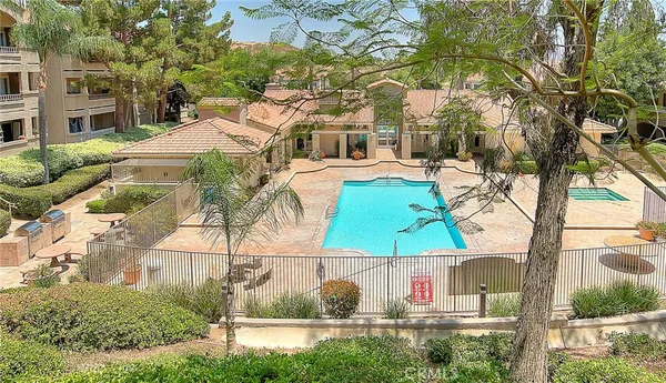 a view of houses with yard