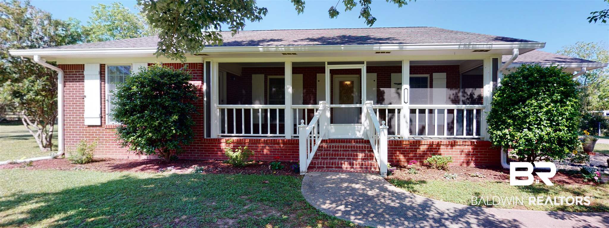 13025 Mary Ann Bch Road Fairhope, AL 36532 - Photo 1 of 13 front view of the fully screened in front porch