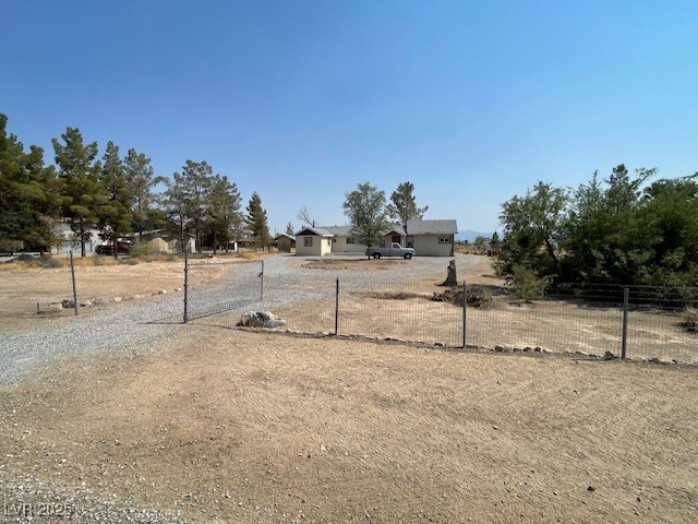 2151 West Simkins Road Pahrump, NV 89060 - Photo 1 of 23 View of front of property