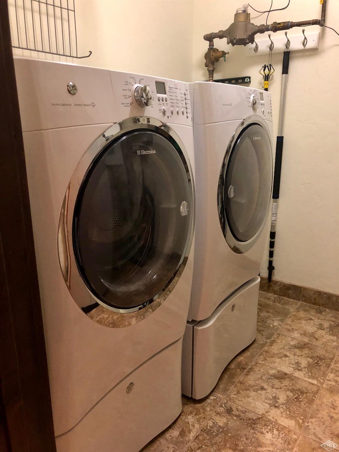 60 County Road, Unit 60A Silverthorne, CO 80497 - Photo 18 of 21 a utility room with dryer and washer