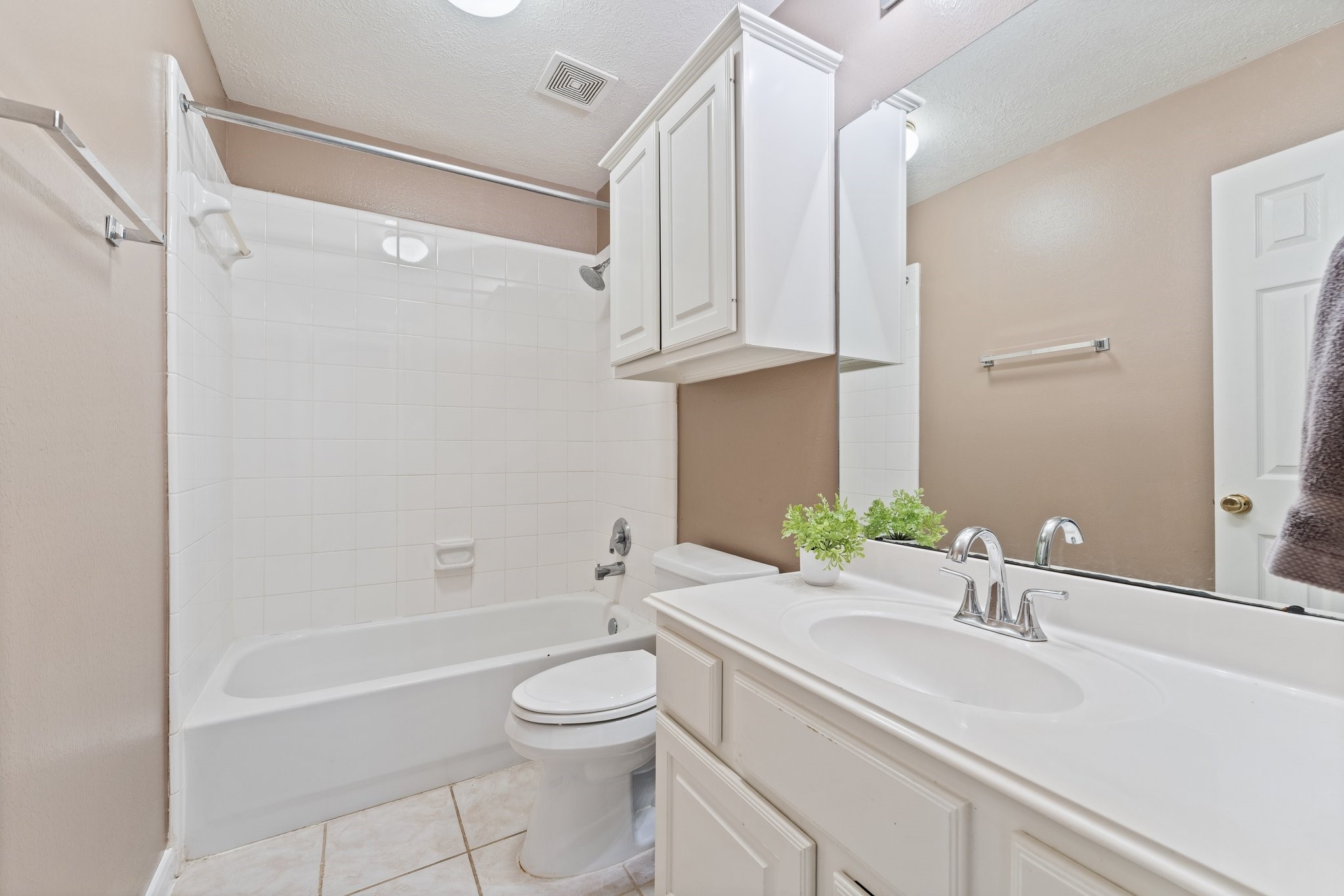 25447 China Springs Spring, TX 77373 - Photo 28 of 45 This clean, functional bathroom is perfect for guests or family, featuring refreshed fixtures and a practical tub/shower setup.