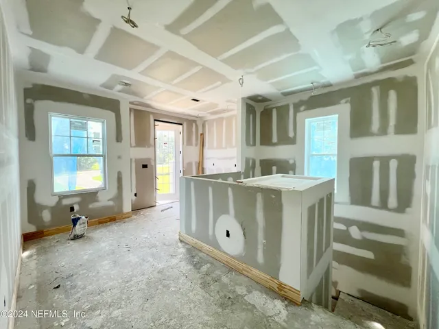 a front view of house with yard and seating area