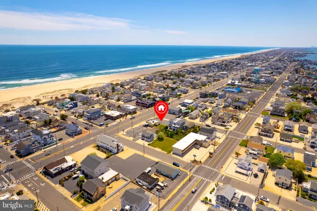 an aerial view of residential building with parking space