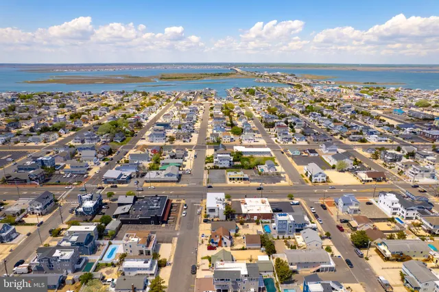 an aerial view of beach and ocean