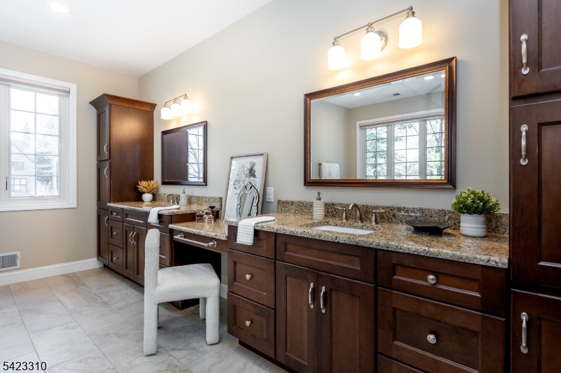26 Mountain Ridge Drive Livingston, NJ 07039 - Photo 23 of 39 a kitchen with a sink stove and refrigerator