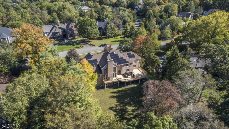 26 Mountain Ridge Drive Livingston, NJ 07039 - Photo 39 of 39 an aerial view of a house with a yard