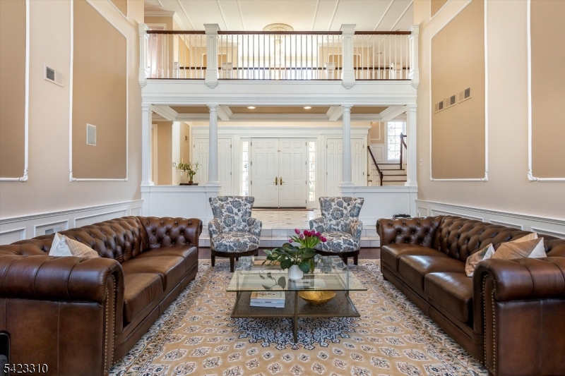 26 Mountain Ridge Drive Livingston, NJ 07039 - Photo 5 of 39 a living room with furniture and a large window