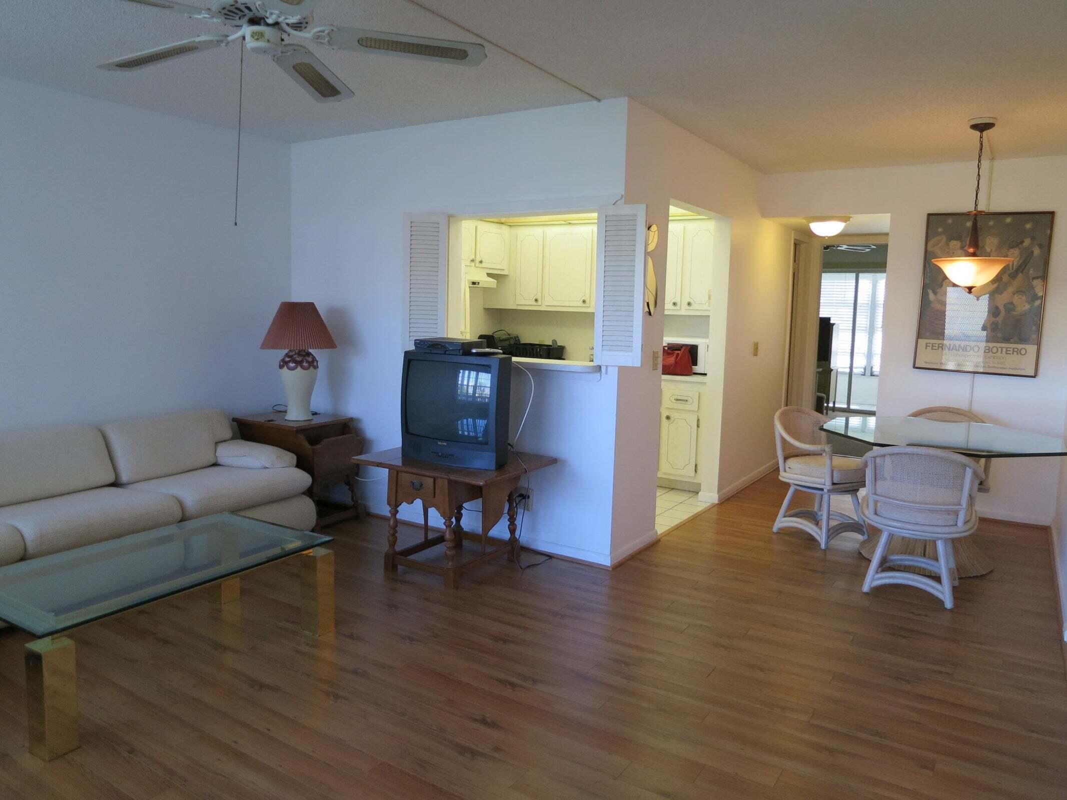 567 Fanshaw North Boca Raton, FL 33434 - Photo 5 of 8 a living room with furniture and a wooden floor