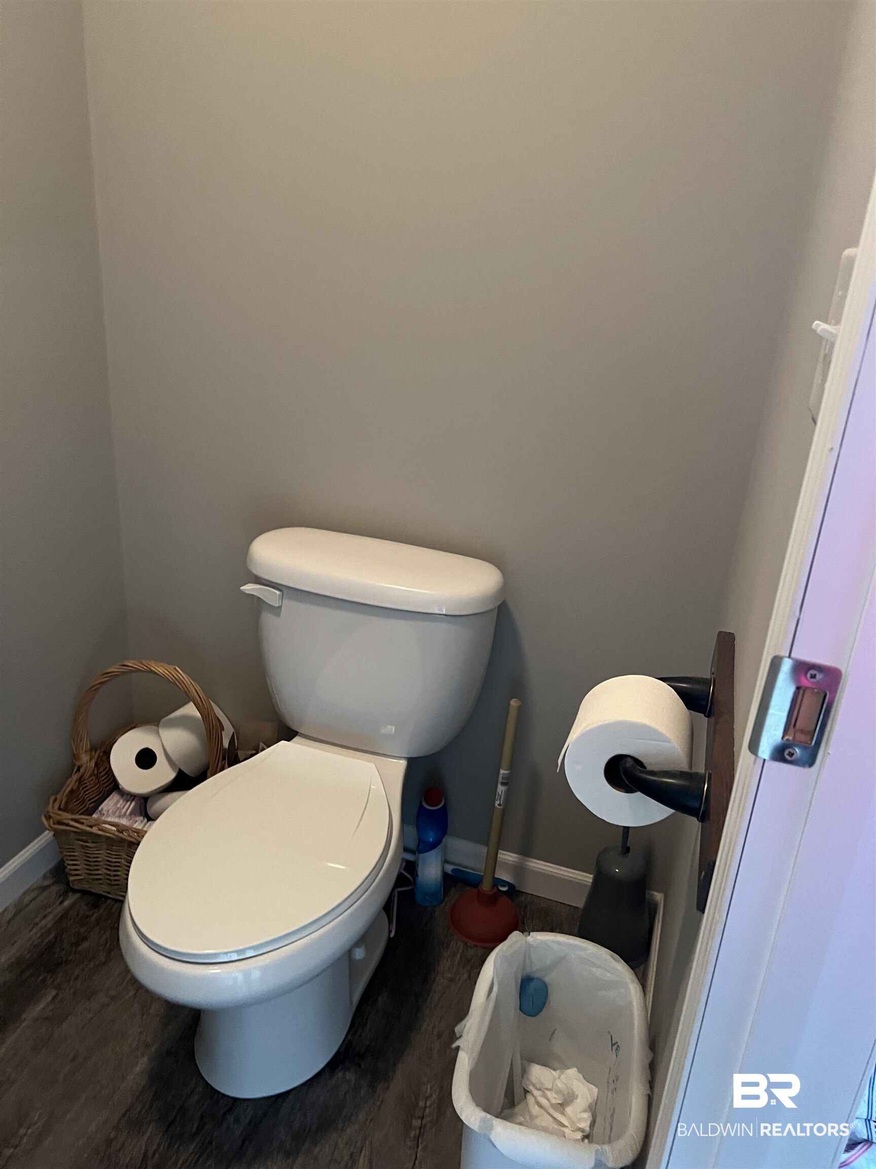 16824 Underwood Road Foley, AL 36535 - Photo 22 of 25 Bathroom featuring wood-type flooring and toilet