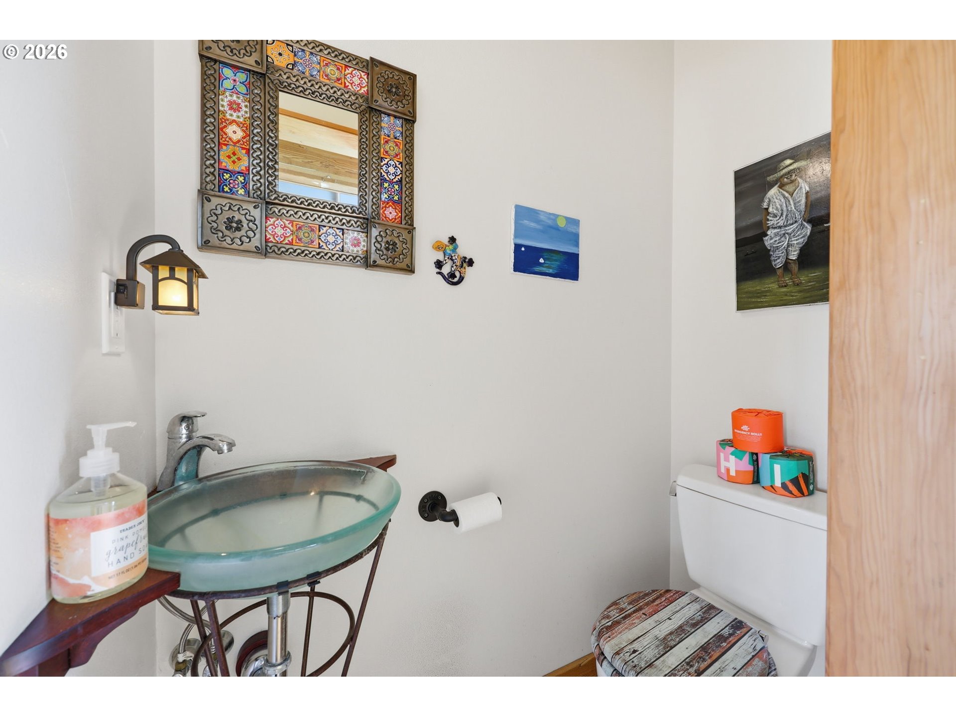 34326 Johnson's Landing Road, Unit C27 Scappoose, OR 97056 - Photo 13 of 38 a bathroom with a sink a toilet and a mirror