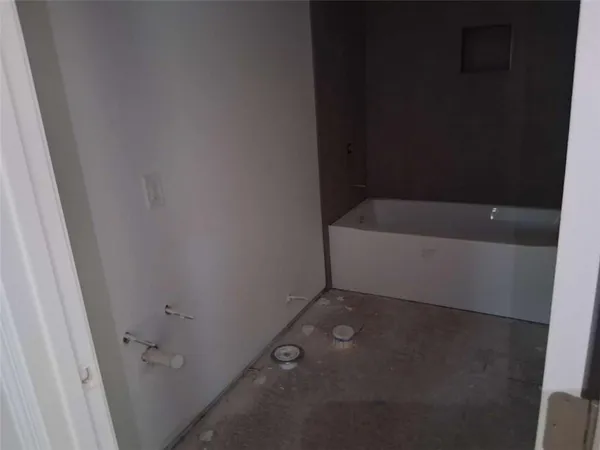 a bathroom with a bathtub