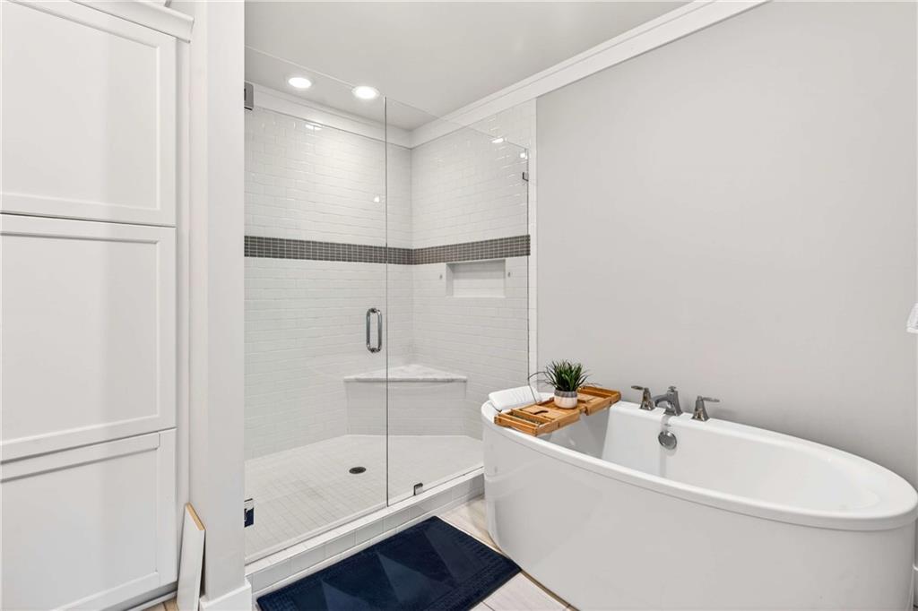 2974 Hermance Drive Northeast Atlanta, GA 30319 - Photo 17 of 38 a white bath tub sitting next to a white sink