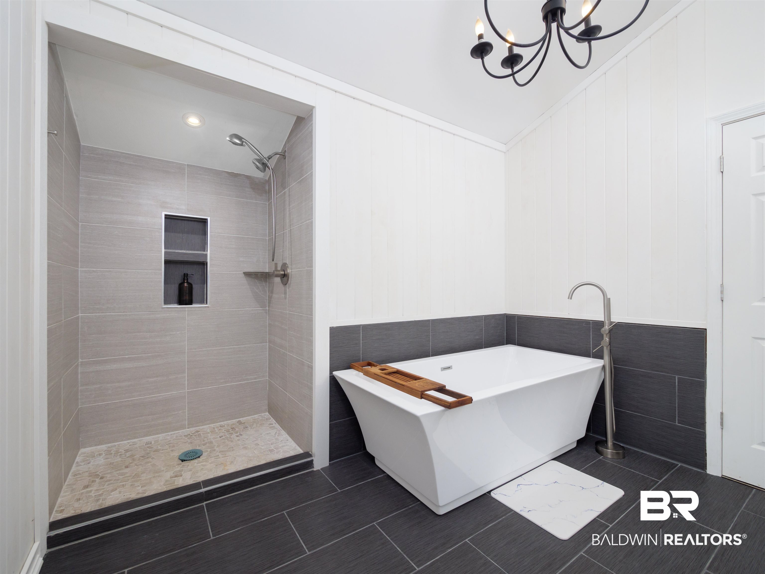494 Ridgewood Drive Daphne, AL 36526 - Photo 29 of 40 Bathroom featuring tile walls, shower with separate bathtub, and tile patterned flooring