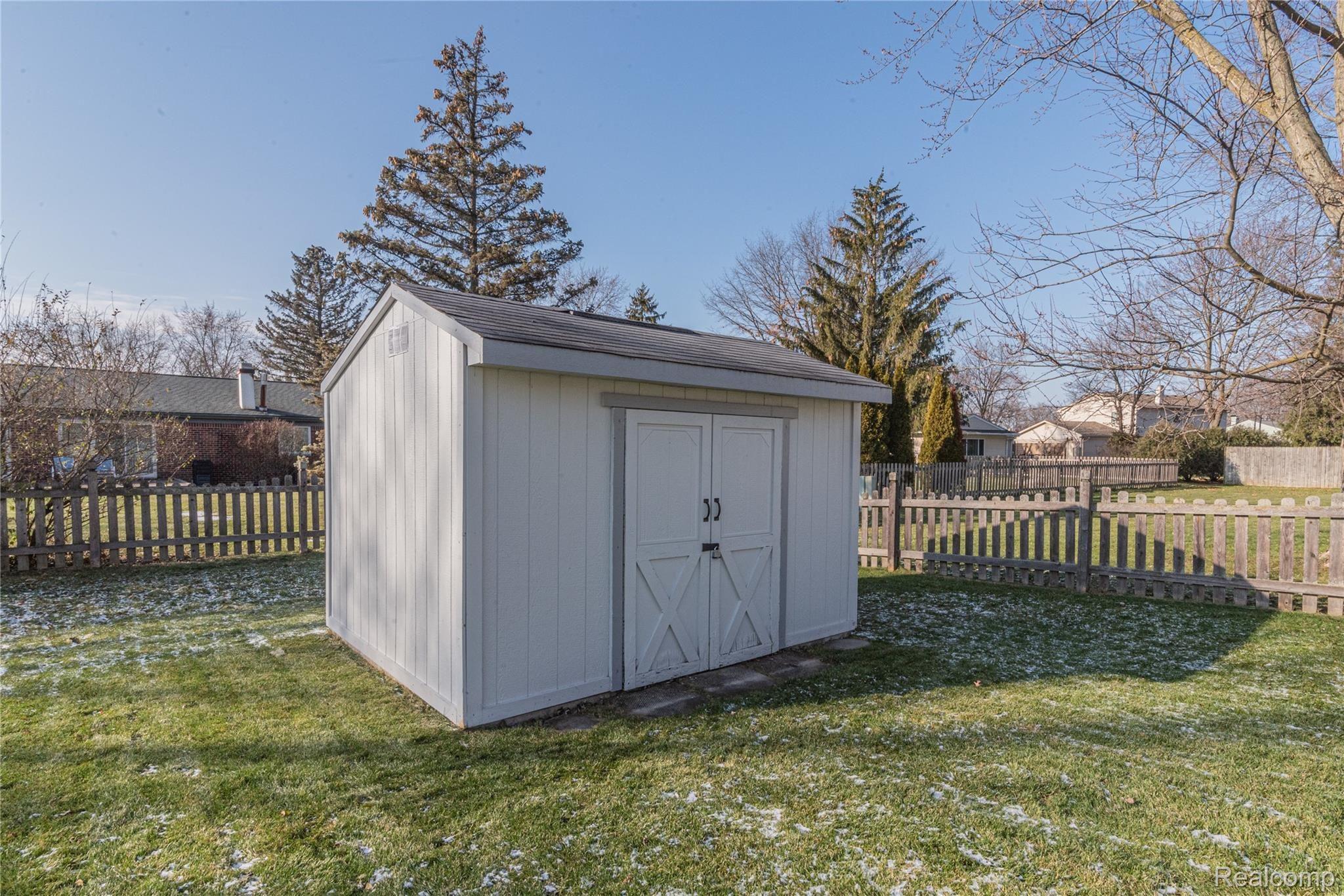 22647 Deerfield Road Novi, MI 48375 - Photo 49 of 51 Storage Shed frees up garage space