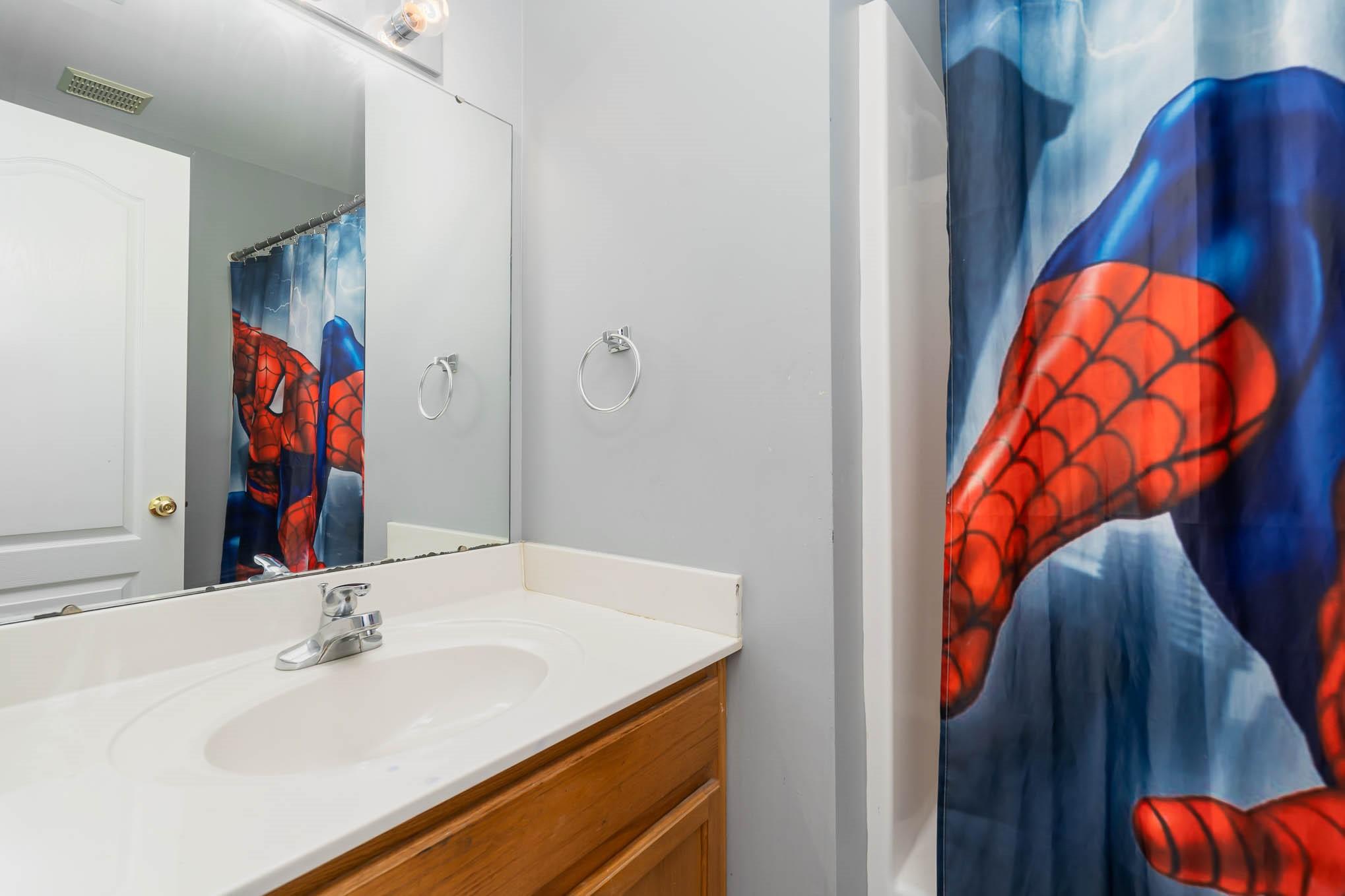 12832 Windyedge Road Huntersville, NC 28078 - Photo 19 of 28 a bathroom with a sink and a mirror