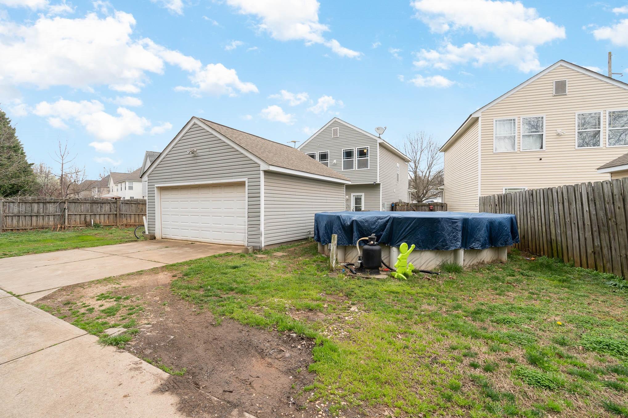 12832 Windyedge Road Huntersville, NC 28078 - Photo 26 of 28 a view of a house with swimming pool and sitting area