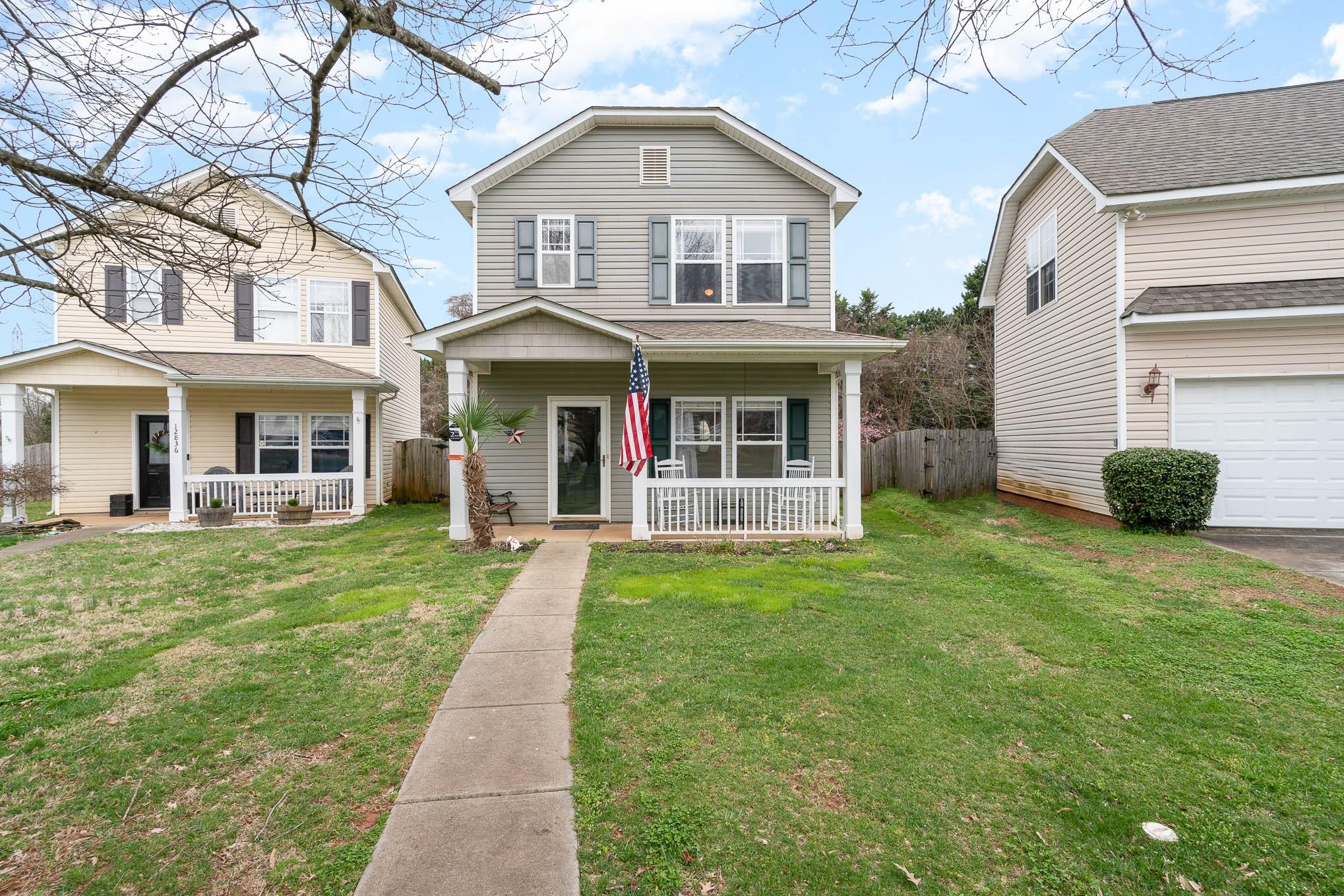 12832 Windyedge Road Huntersville, NC 28078 - Photo 28 of 28 a front view of a house with a yard and porch