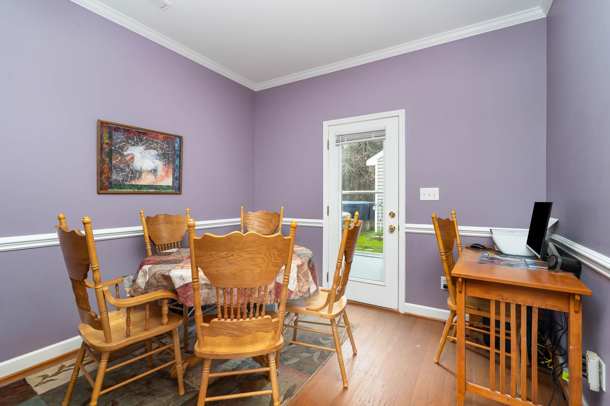 12832 Windyedge Road Huntersville, NC 28078 - Photo 5 of 28 a dining room with furniture and wooden floor