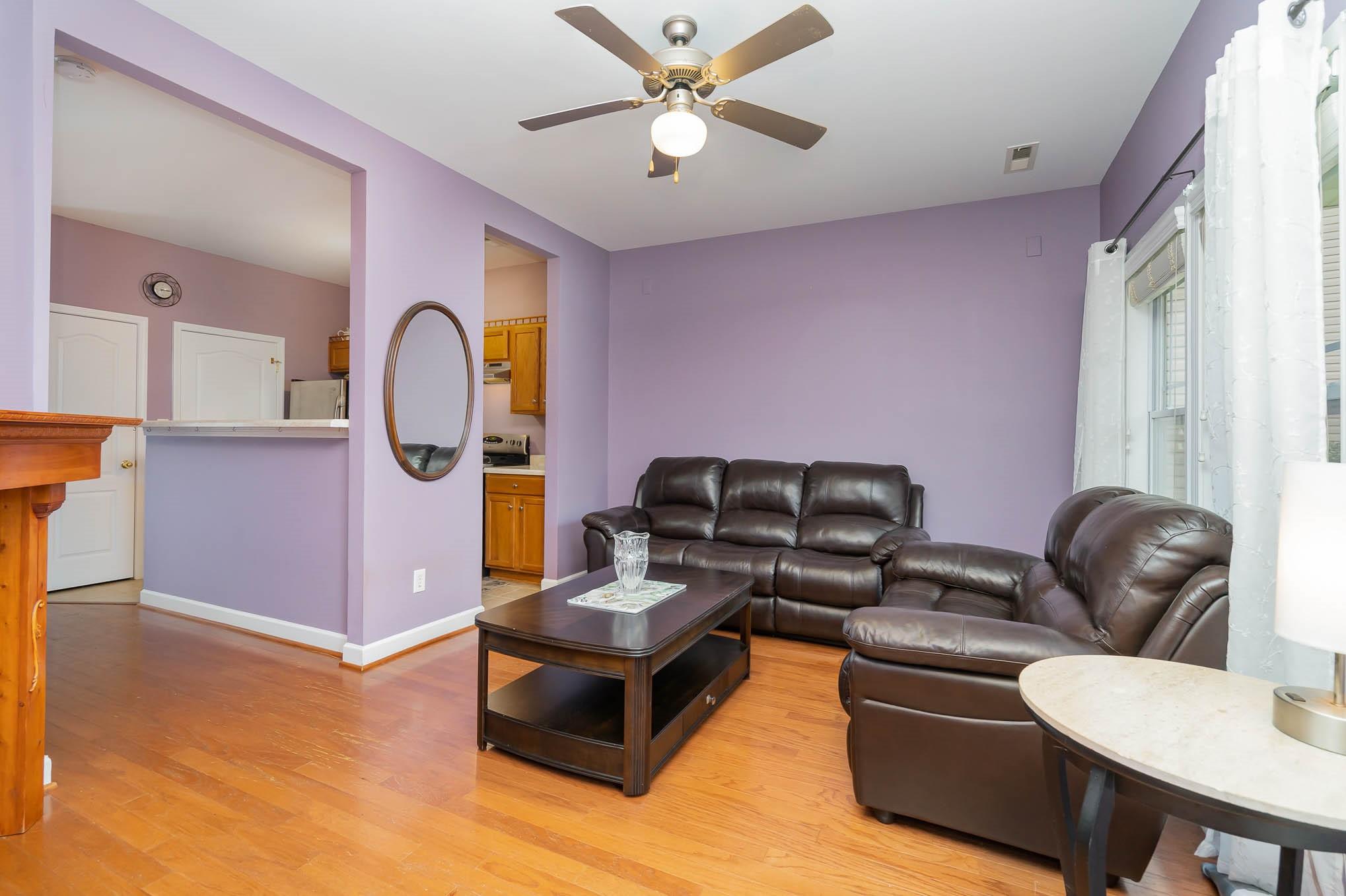 12832 Windyedge Road Huntersville, NC 28078 - Photo 10 of 28 a living room with furniture a rug and a window