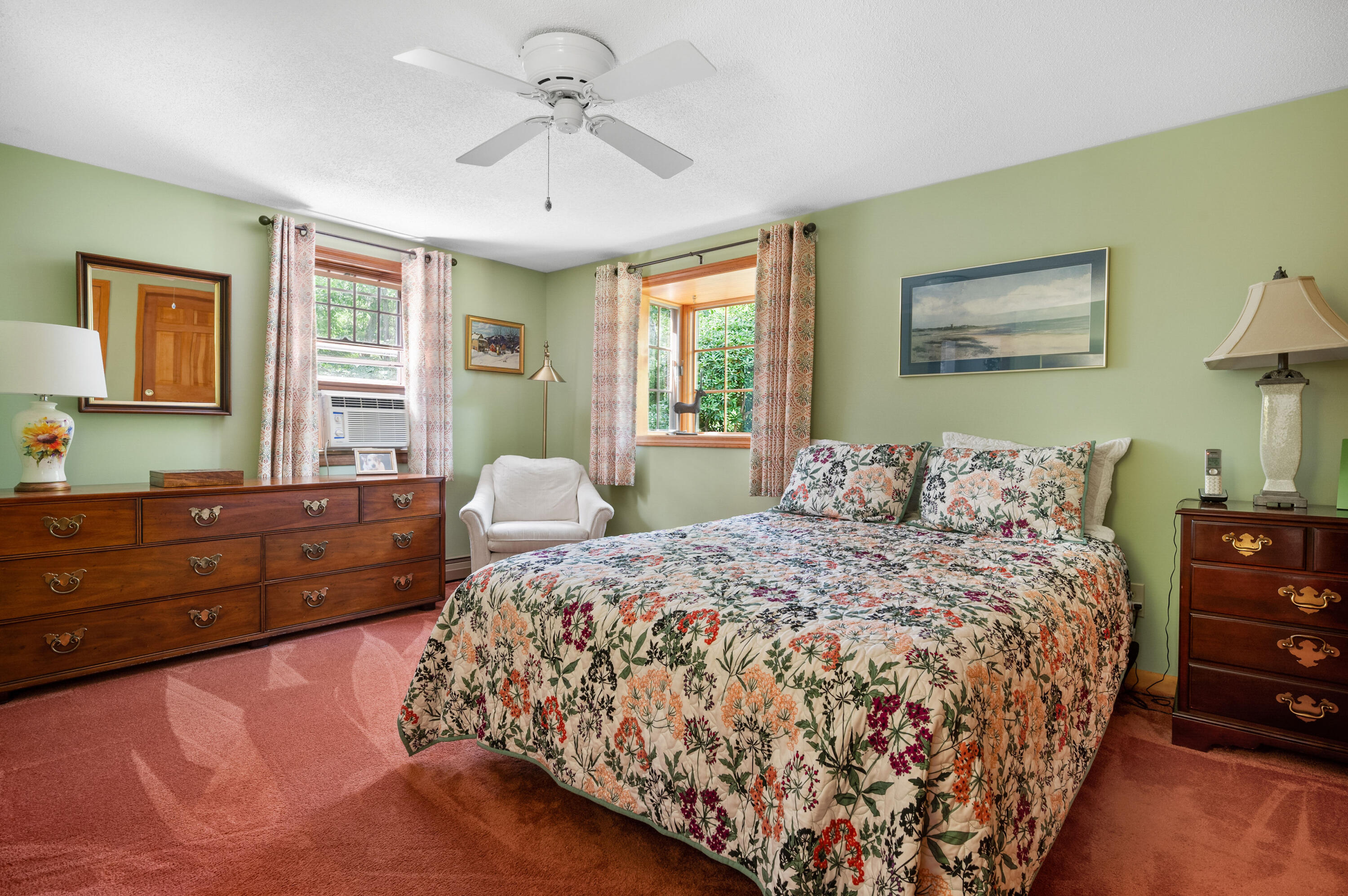 25 Massasoit Trail Eastham, MA 02642 - Photo 15 of 28 a bed room with a bed and a lamp