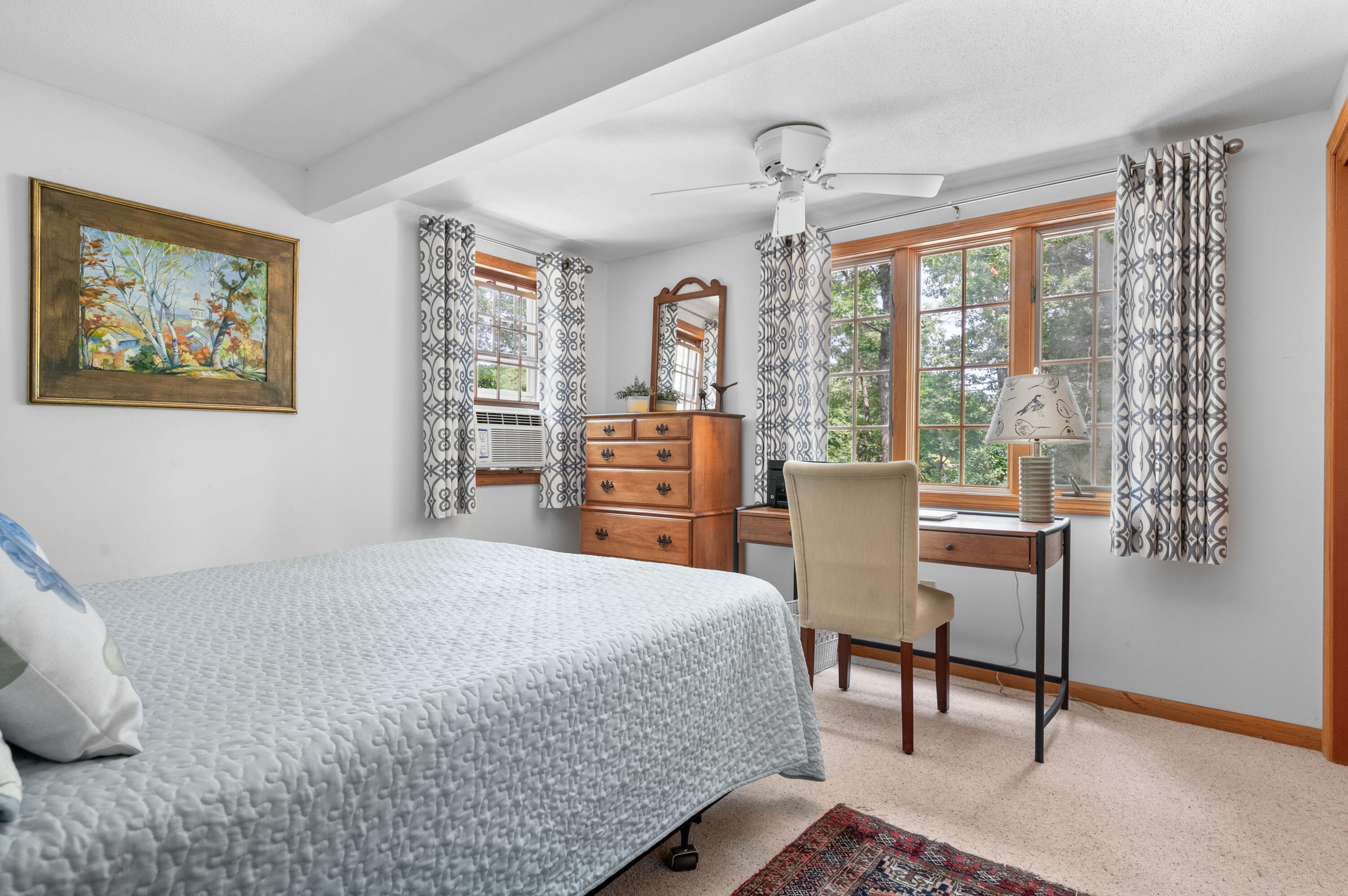 25 Massasoit Trail Eastham, MA 02642 - Photo 18 of 28 a bedroom with a bed and a large window