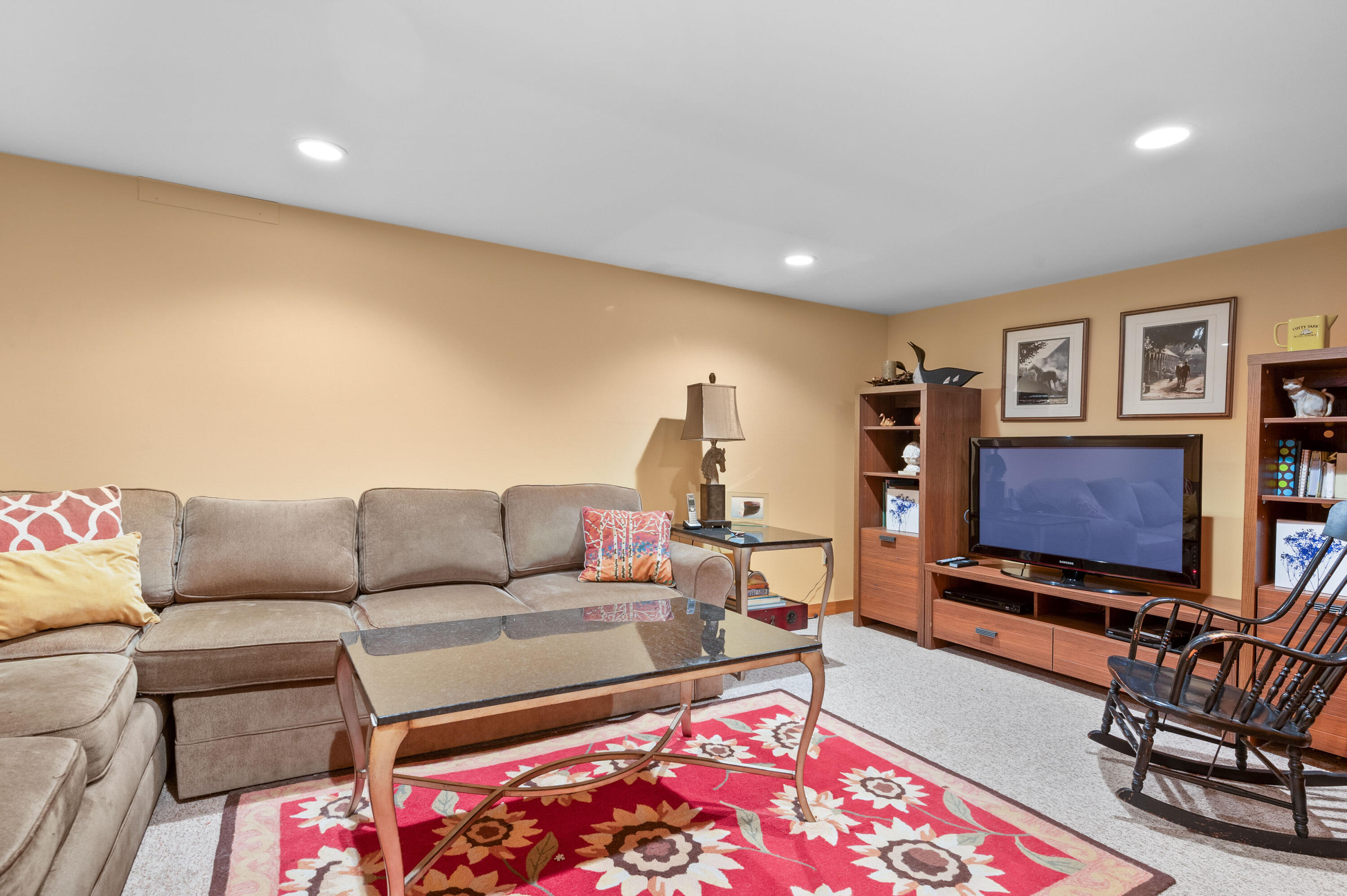 25 Massasoit Trail Eastham, MA 02642 - Photo 21 of 28 a living room with furniture and a flat screen tv