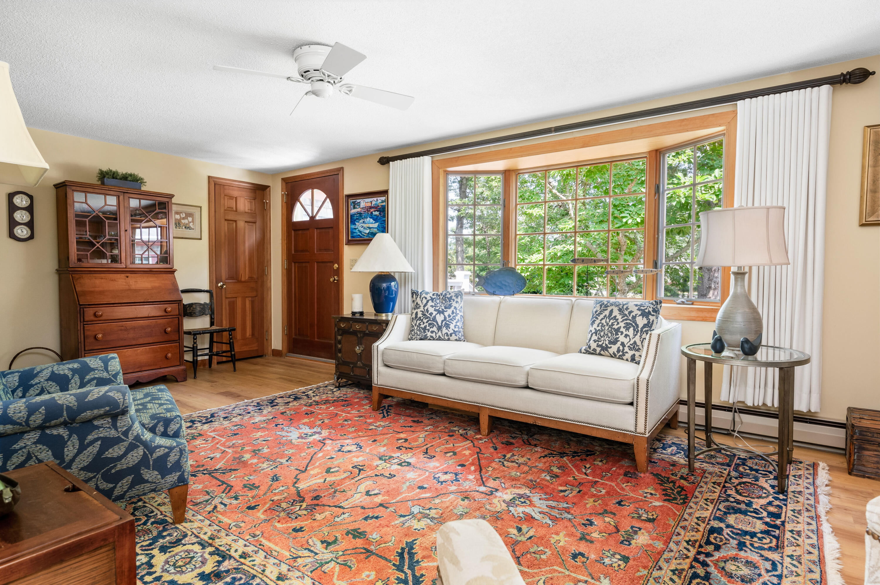 25 Massasoit Trail Eastham, MA 02642 - Photo 5 of 28 a living room with furniture and a window