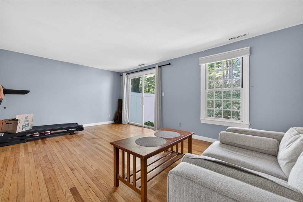 68 Jericho Road, Unit 68 Weston, MA 02493 - Photo 12 of 25 a living room with furniture and a window