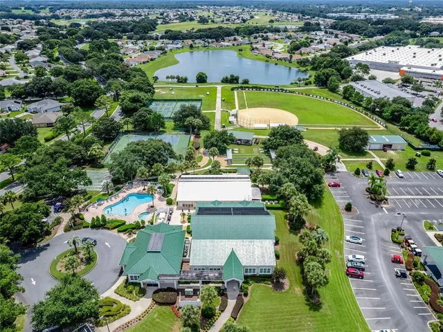 an aerial view of a house with a garden