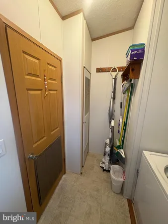 a kitchen with stainless steel appliances granite countertop a stove a microwave and a sink