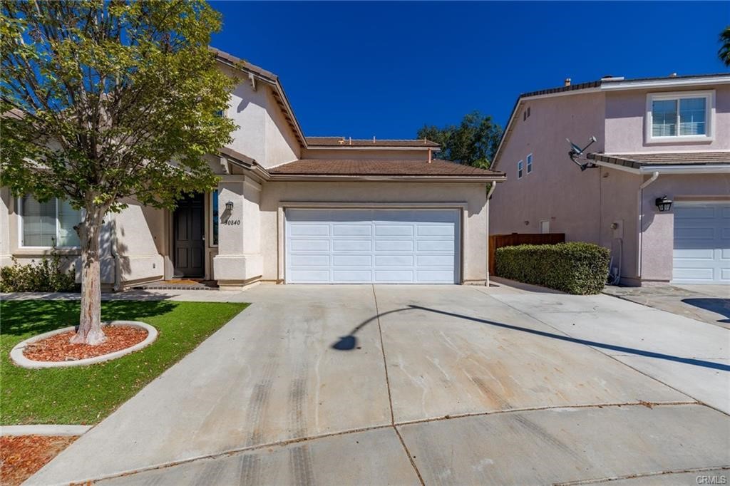 30840 Point Woods Court Temecula, CA 92591 - Photo 3 of 35 a front view of a house with garden
