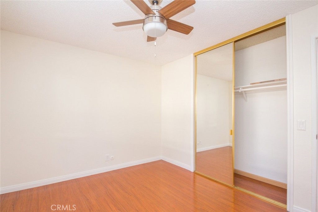 2940 North Verdugo Road, Unit 321 Glendale, CA 91208 - Photo 13 of 38 a view of empty room with wooden floor and fan