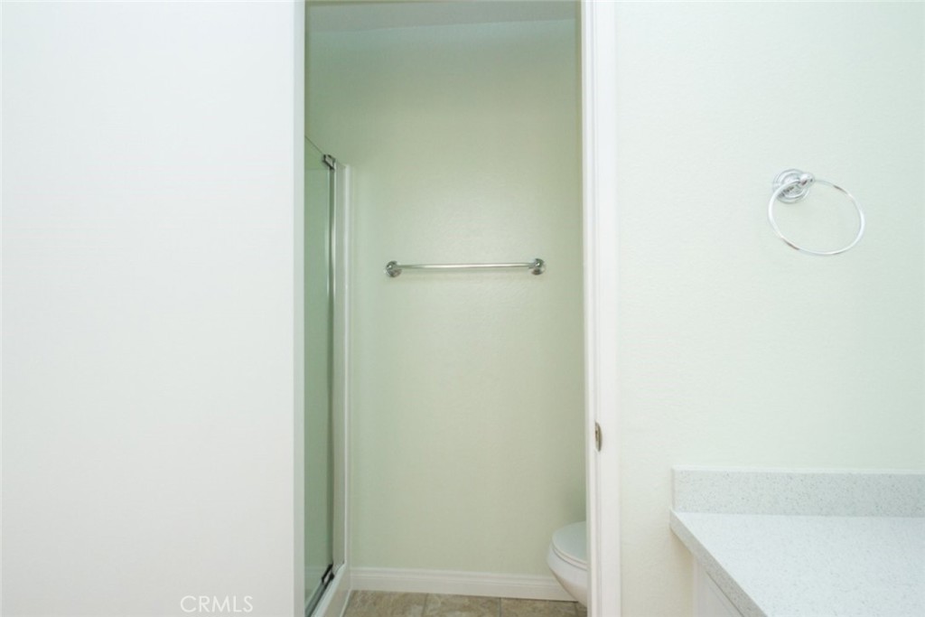 2940 North Verdugo Road, Unit 321 Glendale, CA 91208 - Photo 18 of 38 a bathroom with a glass shower door