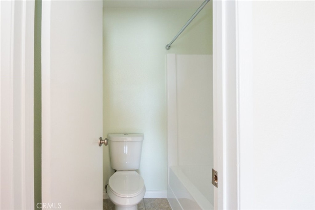 2940 North Verdugo Road, Unit 321 Glendale, CA 91208 - Photo 24 of 38 a white toilet sitting next to a shower