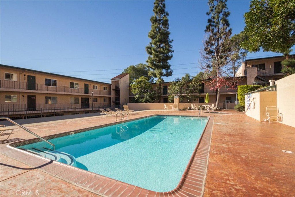2940 North Verdugo Road, Unit 321 Glendale, CA 91208 - Photo 32 of 38 a view of swimming pool with a lounge chairs