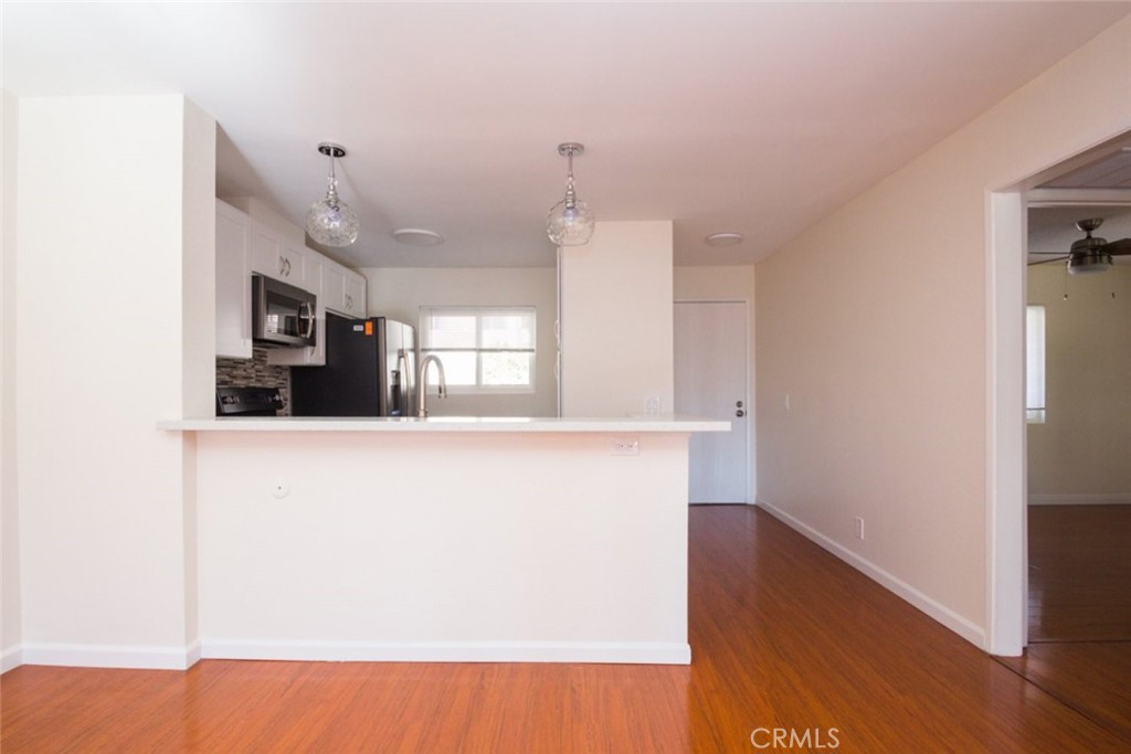 2940 North Verdugo Road, Unit 321 Glendale, CA 91208 - Photo 6 of 38 a view of kitchen with window and wooden floor