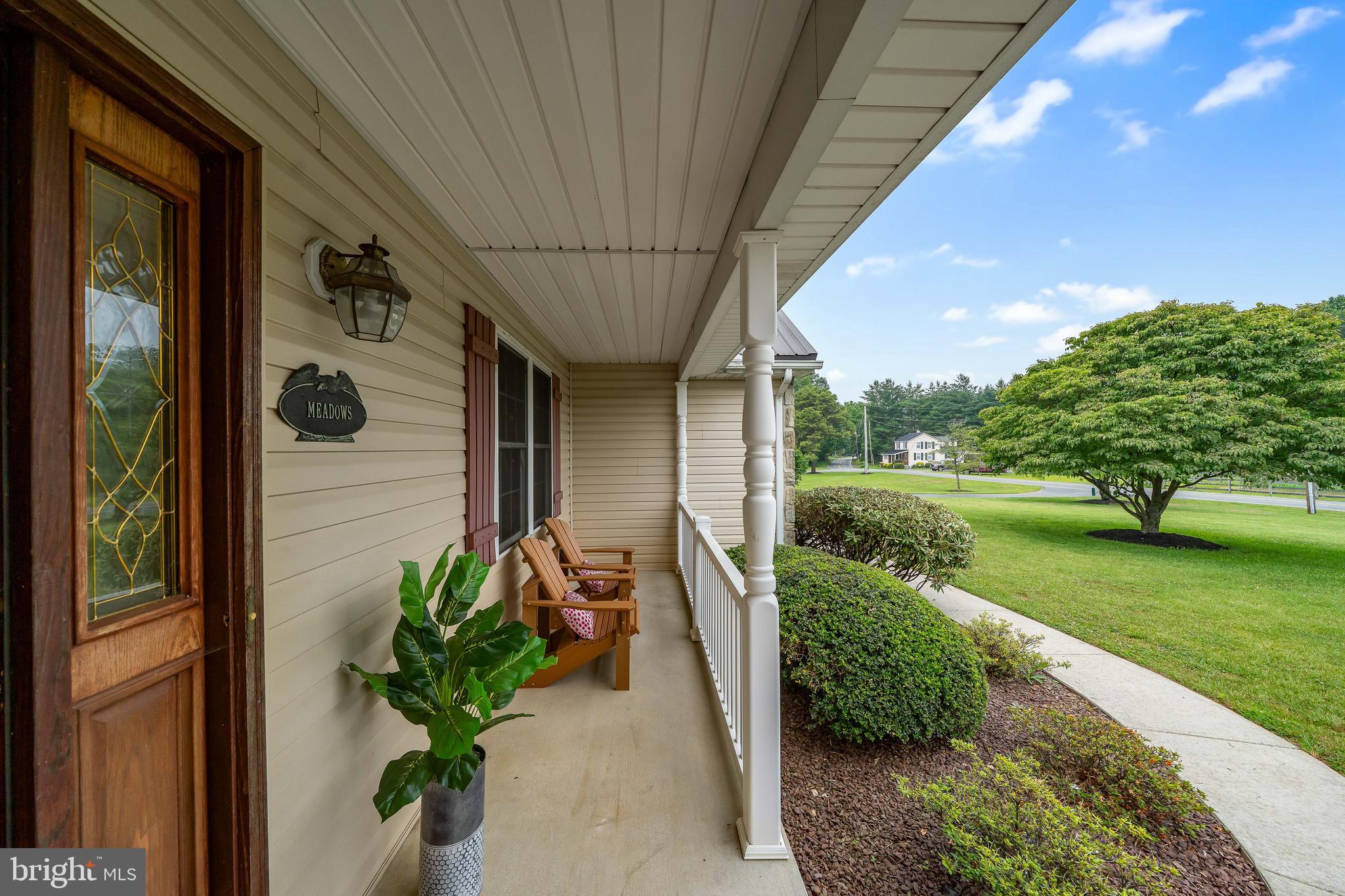 284 Little New York Road Rising Sun, MD 21911 - Photo 6 of 62 Enjoy the spacious sitting area on the front porch