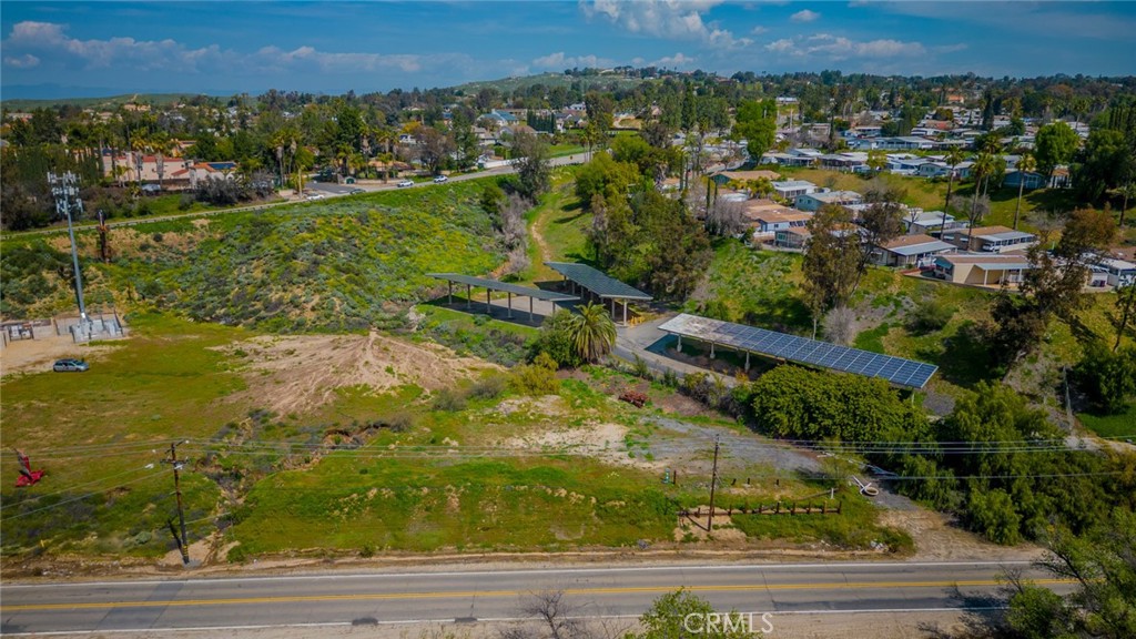 16400 Mockingbird Canyon Road Riverside, CA 92504 - Photo 1 of 1 an aerial view of residential houses with outdoor space and trees