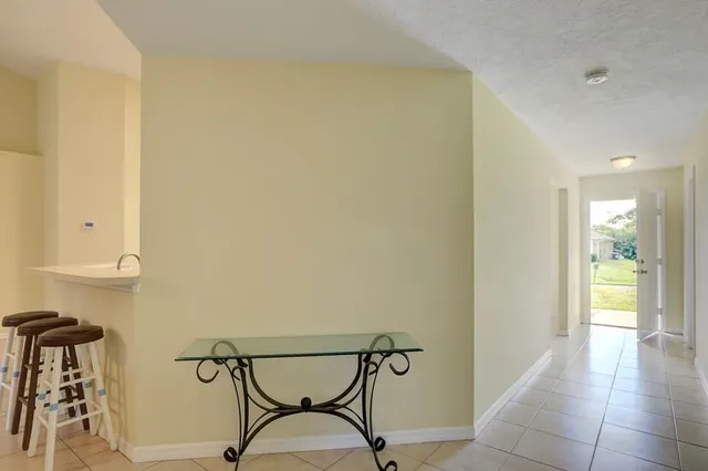 a view of entryway with livingroom