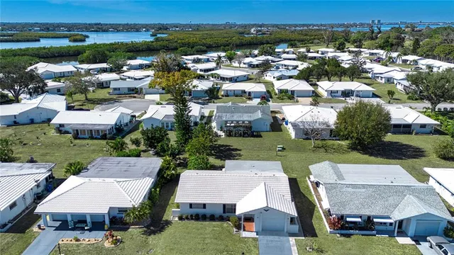 a living room with furniture a rug and a window