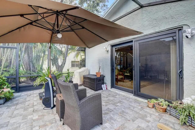 a view of an outdoor space with porch and furniture