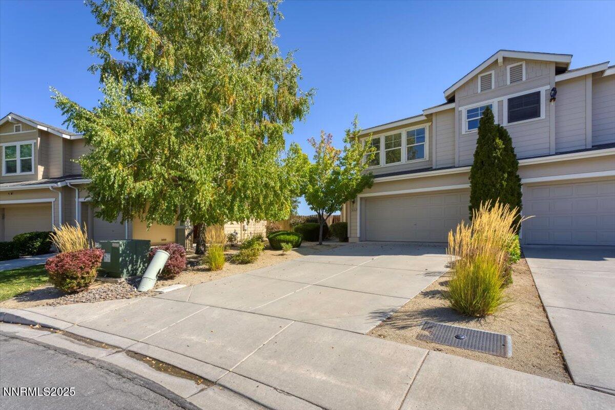 9252 Lone Wolf Circle Reno, NV 89506 - Photo 2 of 26 a view of a house with sitting area and furniture